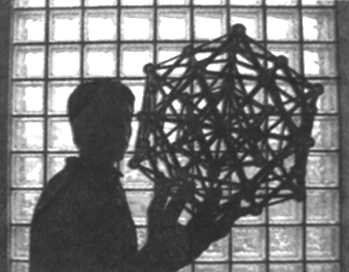 Kevin Chan, with a model of an icosahedron, actually two, one inside the other. He solved a computational problem involving atoms forming the structure.