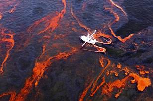 Fishing boat skimming oil