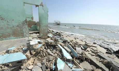 A house on the beach of Doun Baba Dieye, northern Senegal, lies in ruins after sea level rise. Photograph: Seyllou/AFP/Getty Images