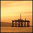 Oil rig at sunset
